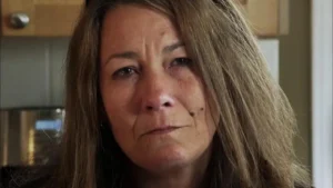 A woman looks at the camera. Christine Boudreau bravely shares her story about her son who was killed while fighting for ISIS